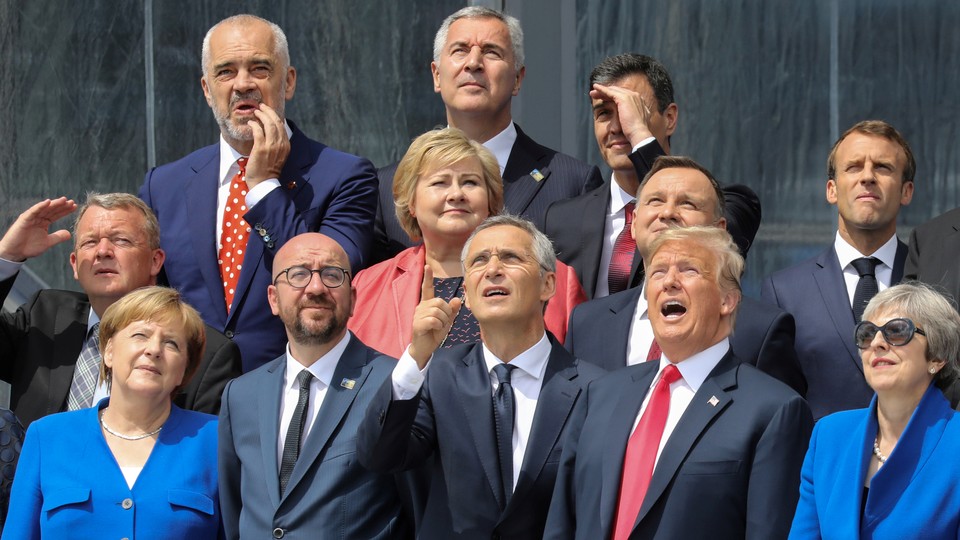 World leaders look confused in a group photo at the NATO summit. 