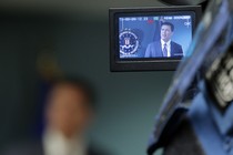 Cameras record former FBI Director James Comey during a news conference in Boston, Massachusetts on November 18, 2014. 