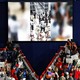 A video from El Salvador’s CECOT prison playing on a screen at a Trump rally