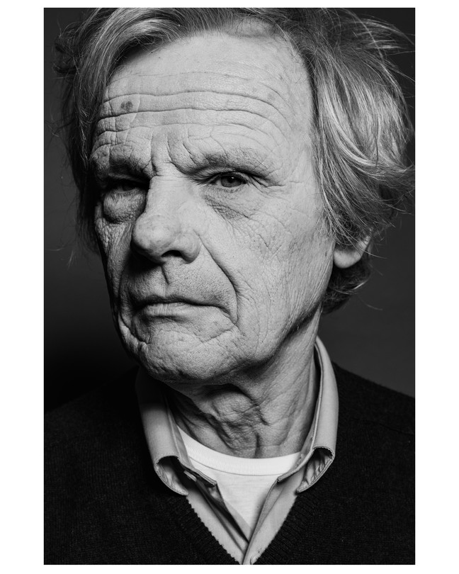 A black and white photo of a man