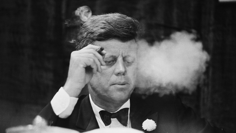 JFK smoking a cigar