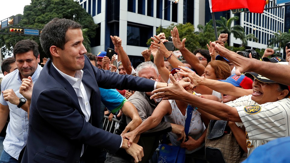 Juan Guaidó greets supporters in Caracas on Wednesday.