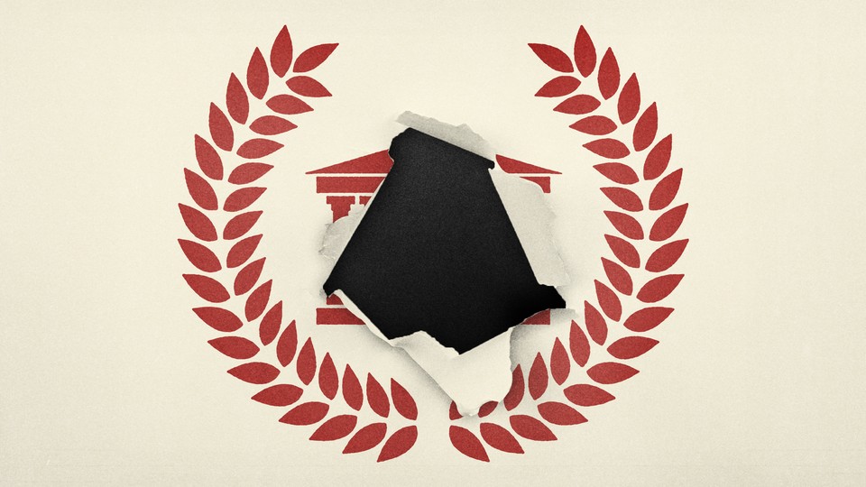 A university insignia with a hole ripped in the center