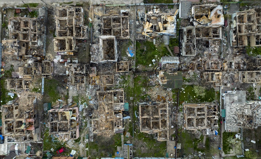 An aerial view of many destroyed houses