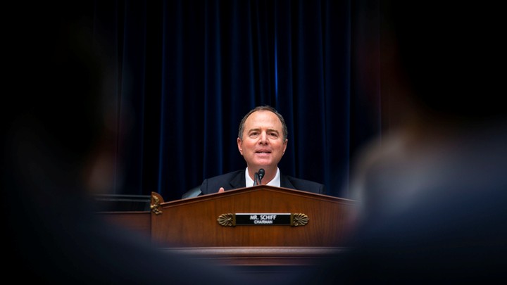 Adam Schiff, center, speaks on Capitol Hill.