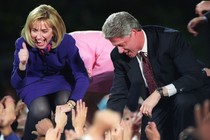 Bill and Hillary Clinton greet supporters at a victory rally in 1992.