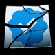 A shattered mirror with a blue checkmark on it