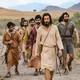 Screenshot from The Chosen, showing Jesus walking with disciples