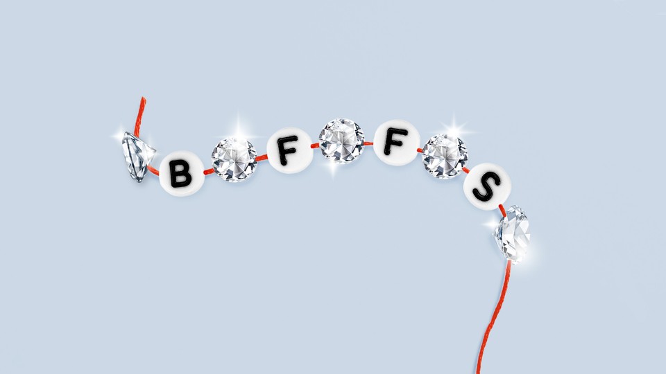 A red thread strung with beads that read "BFFS," interspersed with sparkling diamonds