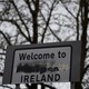 A sign that reads "Welcome to Northern Ireland" with the word "Northern" scratched out.