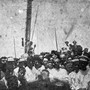 The lynching of James Reed, in Crisfield, Maryland, on July 28, 1907, for the alleged murder of the police officer John H. Daugherty. This image was modified for The Atlantic by the artist Ken Gonzales-Day, whose technique, as showcased in his "Erased Lynchings" project, is to digitally remove the victim from historical photographs of lynchings. By erasing the victims’ bodies, Gonzales-Day pushes the viewer to focus on the crowd and, by proxy, the racism and bias that were foundational to these acts of violence.