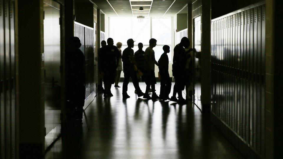 Students walk through the hallway of a Philadelphia high school
