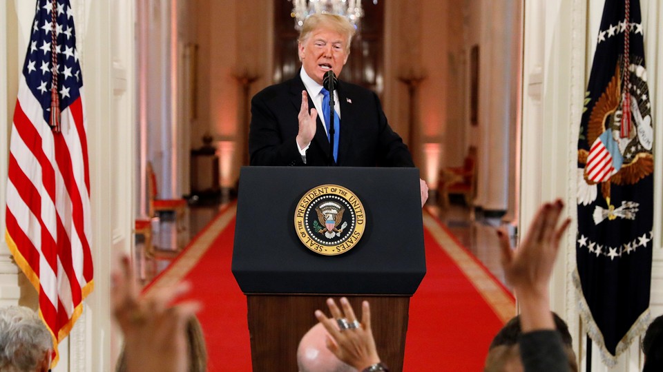 Trump addresses reporters at a post-midterms press conference.