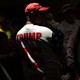 A Trump supporter wears a red hat and a Trump jersey