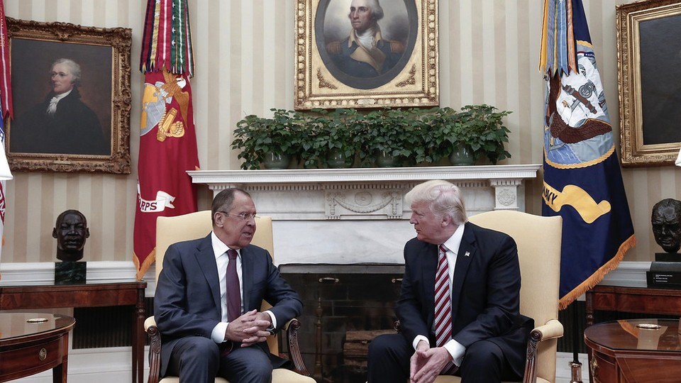 Russian Foreign Minister Sergei Lavrov and President Trump chat in the Oval Office on Wednesday.