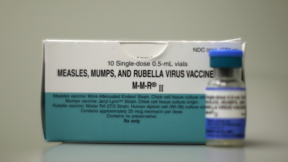 A dose of a measles, mumps, and rubella vaccine