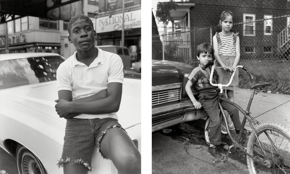 2 black-and-white photos: man in cutoffs and polo shirt sits on polished car hood with storefronts behind; young boy sits on bumper of car straddling front of bike next to girl standing on sidewalk with chain-link fence and house behind