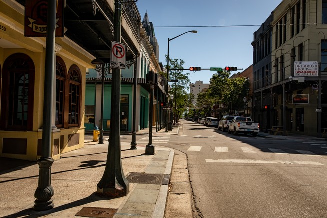 Dauphin Street, in Mobile, Alabama, seen mostly empty before Governor Kay Ivey allowed most Alabama businesses to reopen. Mobile County has had more confirmed cases than anywhere else in the state.