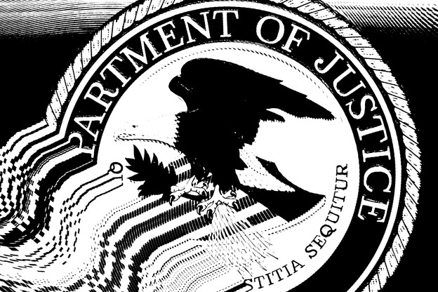 Illustration of the Department of Justice’s seal melting