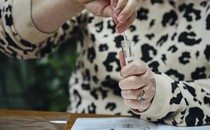 a woman uses a coronavirus test