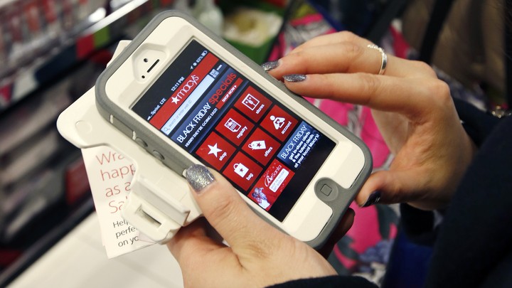 A person shops on a smartphone.