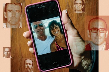 A woman holds up an iPhone, showing an image of her with Derek Mylan Alldred