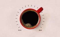A mug of coffee surrounded by a min–max dial