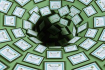 Illustration of framed diplomas falling into a dark hole in the ground