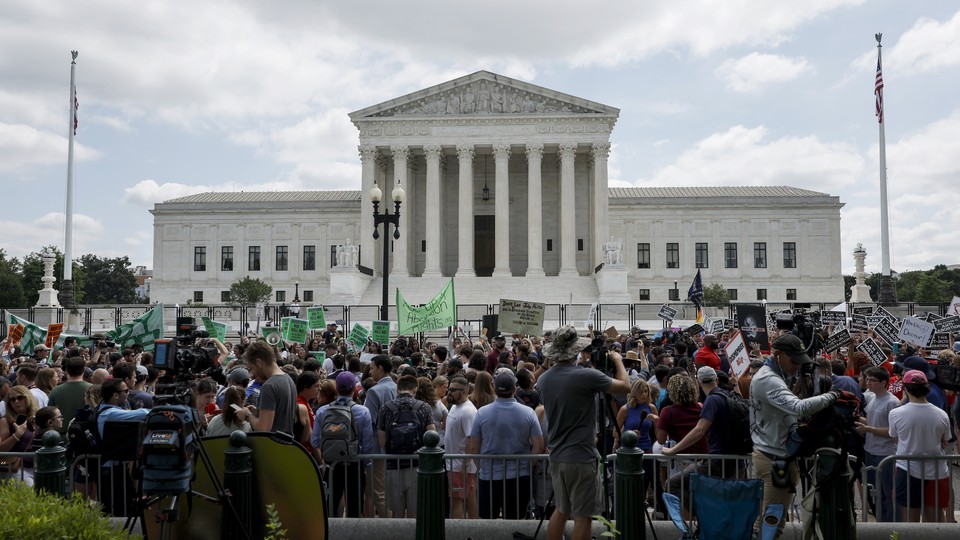 Abortion-rights and anti-abortion-rights activists in front of the U.S. Supreme Court