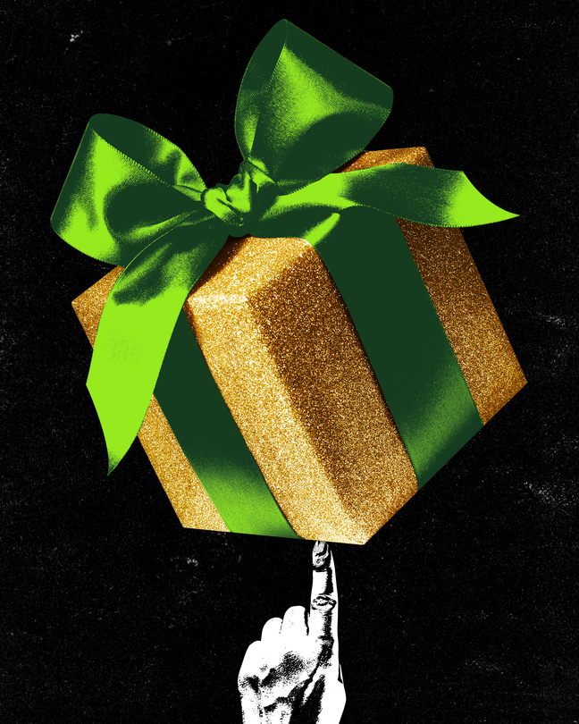 A big sparkly gift balanced on a finger