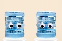 Two water coolers looking at each other awkwardly