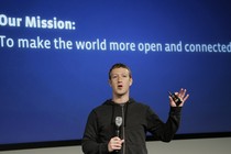 Mark Zuckerberg onstage with a microphone