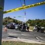 Police tape marks off a neighborhood street in Austin, Texas.
