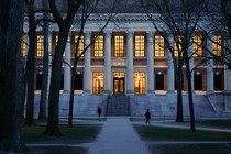 Pedestrians walk through Harvard Yard on the Harvard University campus in Cambridge, Massachusetts, US, on Wednesday, April 16, 2025.