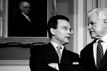 Simon Rosenberg, the New Democratic Network president and founder, talks with Senator Ted Kennedy during a news conference to promote comprehensive immigration reform in the U.S. Capitol.