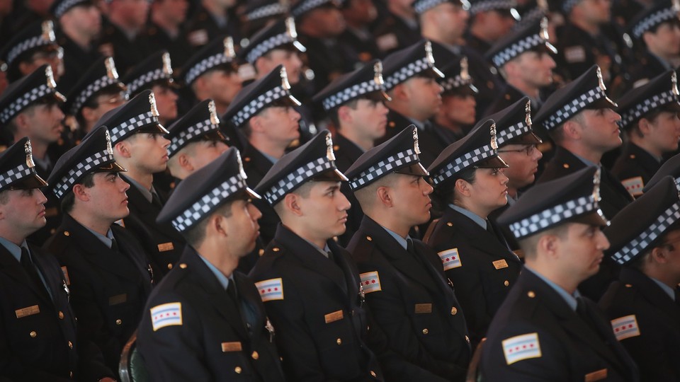 crowd of police officers in uniform