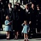 Three-year-old John Kennedy Jr. salutes his father's casket as it leaves the Cathedral of St. Matthew the Apostle in Washington, D.C., en route to Arlington National Cemetery.