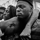 Emotional protesters embrace in West Baltimore over the death of Freddie Gray, 25, who died in police custody in 2015.