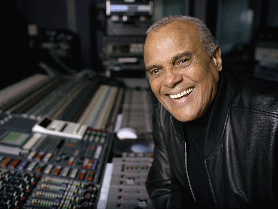 Harry Belafonte poses for a portrait in a recording studio.
