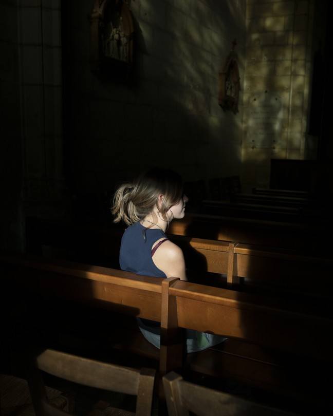 woman in church pew