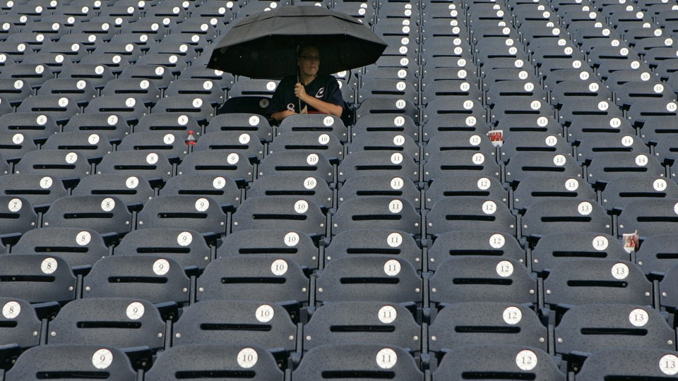 Woman in baseball stands