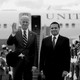 Joe Biden and Jill Biden wave to the camera and stand next to Guatemalan Foreign Minister Carlos Morales after descending in front of Air Force Two.
