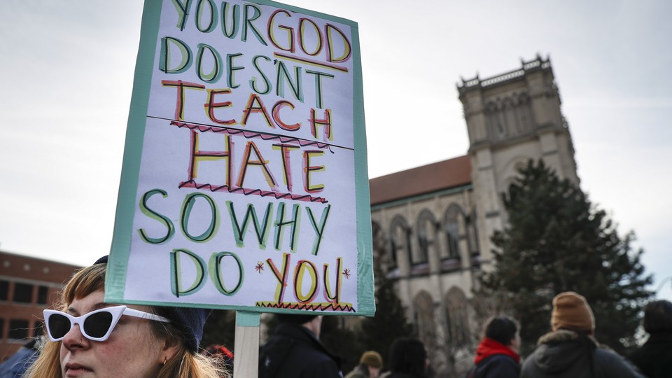 Protesters gather outside the Catholic Diocese of Covington on January 22, 2019.