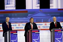 Asa Hutchinson, Chris Christie, and Mike Pence on the debate stage