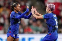 Alyssa Thompson substituting in with Megan Rapinoe in a soccer match