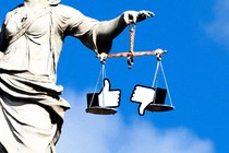 Scales of justice with "Like" and "Dislike" icons