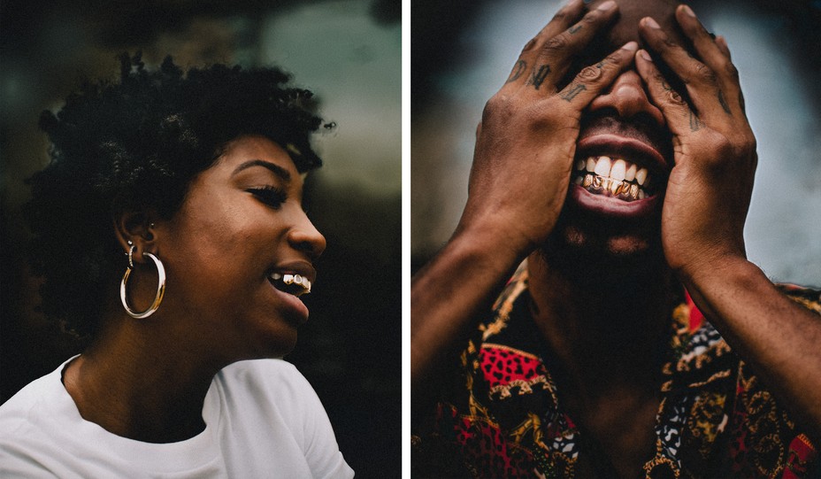 A woman in profile smiles and a man covers his eyes and shows his teeth