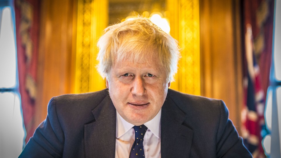 Boris Johnson, backlit by yellow light, stares straight into the camera.