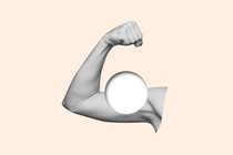 A flexed arm with a hole punch where the bicep should be