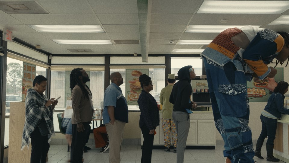 Image from "I'm a Virgo" where a character hunches over in a line